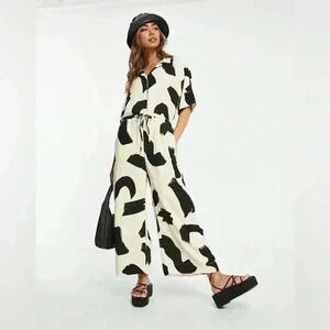 Monki oversized wide leg jumpsuit with tie waist in abstract print size XL